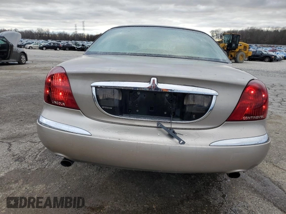 2001 Lincoln Continental z VIN 1LNHM97V41Y633841, wystawiony jako Copart lot #86695664 z przebiegiem 166 931 mil mil oraz Szkoda całkowita • Salvage title. Historia ofert i sprzedaży dostępna na DreamBid. Obrazek 6.