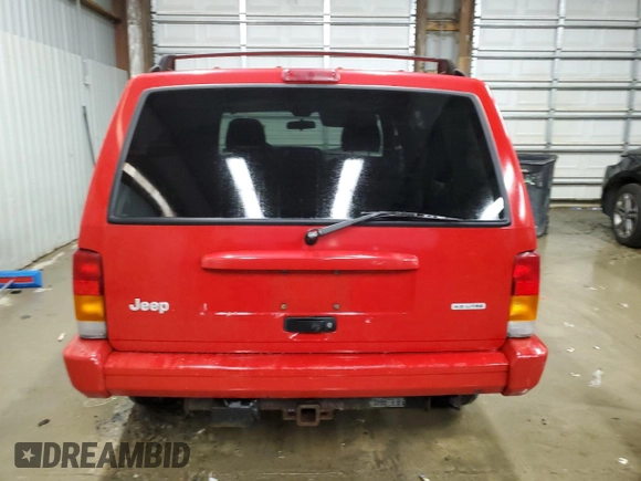 2001 Jeep Cherokee Sport with VIN 1J4FF58S01L519670, listed as a Copart auction lot 84340454 with 132,584 mi miles and Clean title. Bid and sale history available at DreamBid. Image 6.