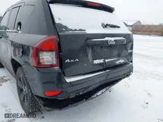 2016 Jeep Compass High Altitude Edition with VIN 1C4NJDEB8GD758174, listed as a IAAI auction lot 41235089 with 144,841 mi miles. Bid and sale history available at carsss.com. Image 6.
