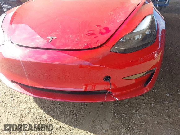 2023 Tesla Model 3 with VIN 5YJ3E1EA9PF546264, listed as a IAAI auction lot 41657055 with 5,634 mi miles and . Bid and sale history available at DreamBid. Image 6.