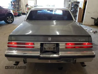 1987 Buick Regal with VIN 1G4GJ11Y4HP413978, listed as a Copart auction lot 72449154 with 52,519 mi miles and Salvage Title. Bid and sale history available at DreamBid. Image 6.