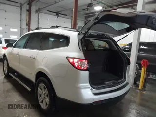2013 Chevrolet Traverse LT with VIN 1GNKVGKD4DJ204519, listed as a IAAI auction lot 41600391 with 190,295 mi miles and . Bid and sale history available at DreamBid. Image 3.