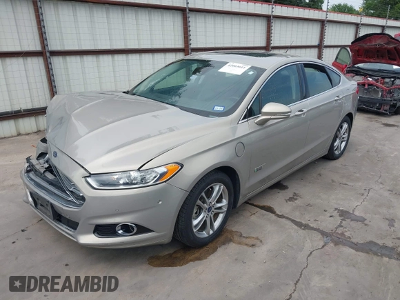 2015 Ford Fusion Energi Titanium with VIN 3FA6P0SU3FR114739, listed as a IAAI auction lot 42003011 with 120,553 mi miles. Bid and sale history available at carsss.com. Image 18.