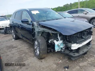 2021 Mazda CX-9 Carbon Edition with VIN JM3TCADY1M0516505, listed as a IAAI auction lot 42016644 with 50,900 mi miles and . Bid and sale history available at carsss.com. Image 1.