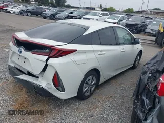 2017 Toyota Prius Plus z VIN JTDKARFP5H3054435, wystawiony jako IAAI lot #42316988 z przebiegiem 82 036 mil mil oraz . Historia ofert i sprzedaży dostępna na DreamBid. Obrazek 4.