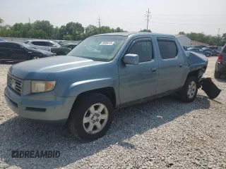 2006 Honda Ridgeline RTL z VIN 2HJYK16516H531360, wystawiony jako Copart lot #59690415 z przebiegiem Nie podano mil oraz Szkoda całkowita • Salvage title. Historia ofert i sprzedaży dostępna na DreamBid. Obrazek 1.