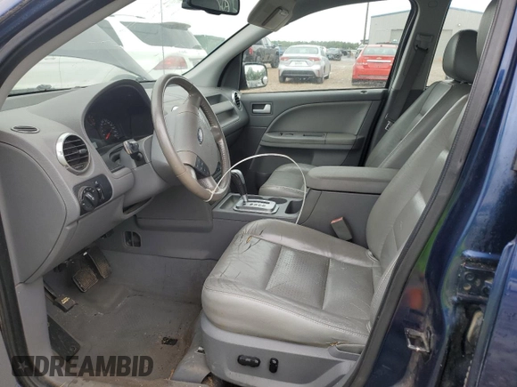 2006 Ford Freestyle SEL z VIN 1FMZK02106GA24446, wystawiony jako Copart lot #56291755 z przebiegiem 154 067 mil mil oraz Szkoda całkowita • Salvage title. Historia ofert i sprzedaży dostępna na DreamBid. Obrazek 7.
