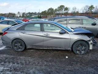 2023 Hyundai Elantra Hybrid Blue with VIN KMHLM4AJ3PU040071, listed as a IAAI auction lot 41363940 with 60,198 mi miles. Bid and sale history available at carsss.com. Image 12.