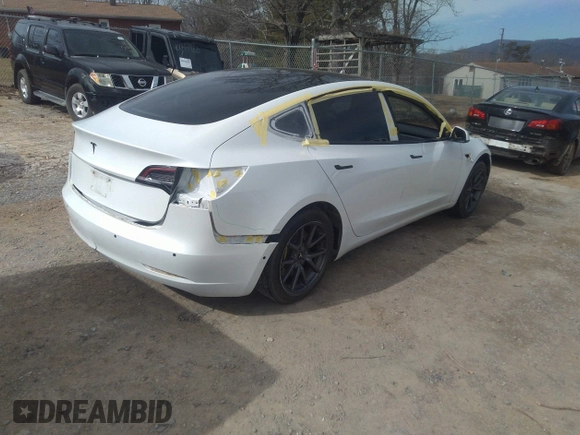 2020 Tesla Model 3 Standard Range Plus with VIN 5YJ3E1EA0LF597839, listed as a IAAI auction lot 41639219 with 49,220 mi miles. Bid and sale history available at carsss.com. Image 4.