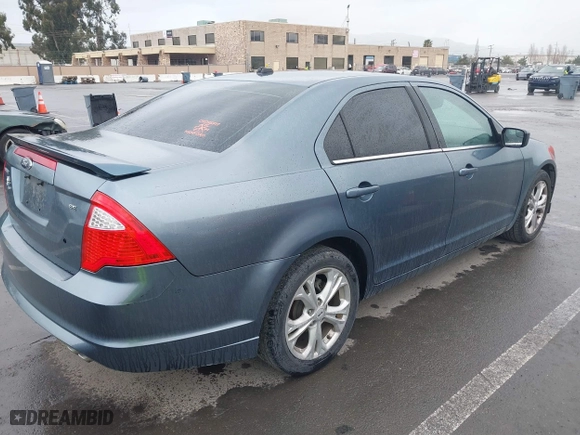 2012 Ford Fusion SE with VIN 3FAHP0HA7CR218880, listed as a IAAI auction lot 41816975 with 175,491 mi miles. Bid and sale history available at carsss.com. Image 4.