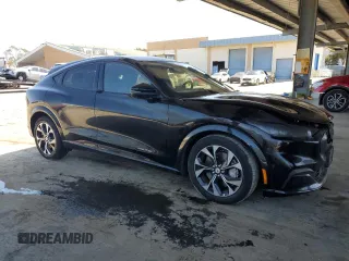 2023 Ford Mustang Mach-E Premium with VIN 3FMTK3SUXPMA96957, listed as a Copart auction lot 52404535 with Not Provided miles and Non Repairable. Bid and sale history available at DreamBid. Image 4.