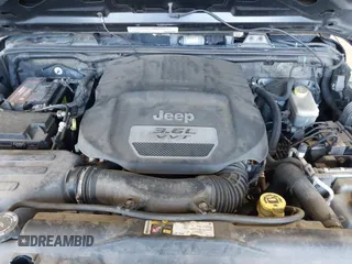 2012 Jeep Wrangler Unlimited Sport with VIN 1C4BJWDG8CL246829, listed as a IAAI auction lot 41816197 with 198,502 mi miles. Bid and sale history available at carsss.com. Image 10.