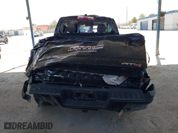 2021 GMC Canyon 4WD AT4 w/Cloth with VIN 1GTG6FEN0M1273816, listed as a Copart auction lot 65976804 with 28,082 mi miles and Salvage Title. Bid and sale history available at carsss.com. Image 6.