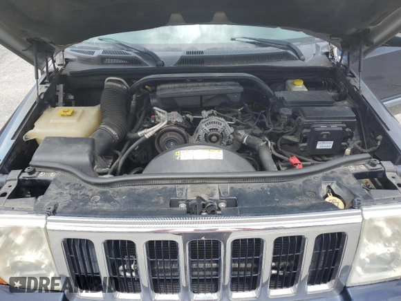 2008 Jeep Commander Sport with VIN 1J8HH48K18C229797, listed as a Copart auction lot 68807034 with 163,589 mi miles and Salvage title. Bid and sale history available at DreamBid. Image 12.
