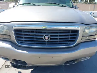 1999 Cadillac Escalade z VIN 1GYEK13R4XR419503, wystawiony jako IAAI lot #42215638 z przebiegiem 174 381 mil mil oraz . Historia ofert i sprzedaży dostępna na DreamBid. Obrazek 6.