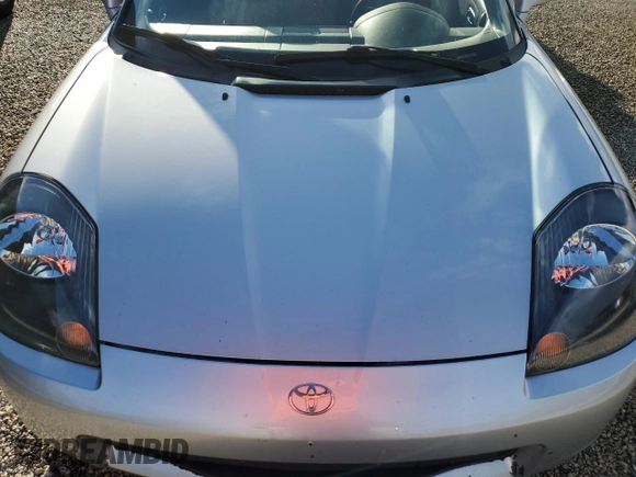 2001 Toyota MR2 z VIN JTDFR320410036287, wystawiony jako Copart lot #73851984 z przebiegiem Nie podano mil oraz Szkody całkowita. Historia ofert i sprzedaży dostępna na DreamBid. Obrazek 11.