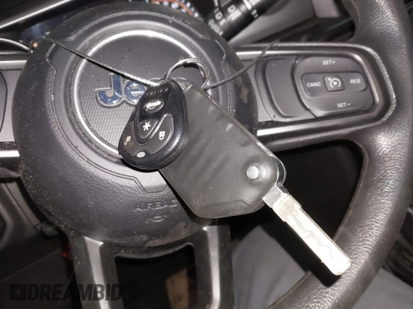 2022 Jeep Wrangler Unlimited Sport with VIN 1C4HJXDG0NW117632, listed as a IAAI auction lot 41185850 with 18,298 mi miles and . Bid and sale history available at DreamBid. Image 11.