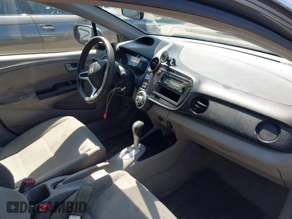 2013 Honda Insight with VIN JHMZE2H31DS002352, listed as a IAAI auction lot 42551515 with 148,393 mi miles and . Bid and sale history available at DreamBid. Image 5.