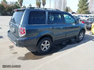 2006 Honda Pilot EX-L with RES with VIN 5FNYF28656B016419, listed as a IAAI auction lot 41620977 with 206,372 mi miles. Bid and sale history available at carsss.com. Image 4.