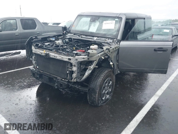 2022 Ford Bronco with VIN 1FMDE5BH5NLB12538, listed as a IAAI auction lot 42161313 with 64,518 mi miles and . Bid and sale history available at DreamBid. Image 6.