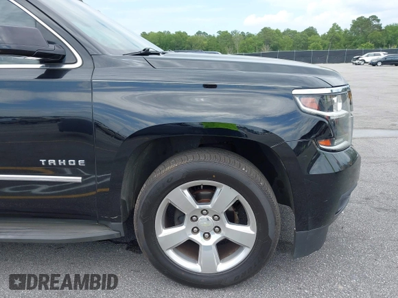 2015 Chevrolet Tahoe LT with VIN 1GNSCBKC4FR145119, listed as a IAAI auction lot 42309931 with 99,408 mi miles and . Bid and sale history available at DreamBid. Image 17.