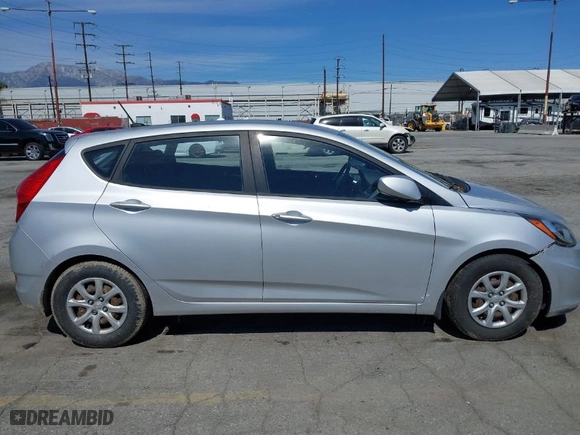 2012 Hyundai Accent GS with VIN KMHCT5AE1CU034744, listed as a IAAI auction lot 41723425 with 176,999 mi miles. Bid and sale history available at carsss.com. Image 13.