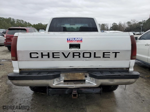 1990 Chevrolet C/K 2500 with VIN 2GCFK29K5L1177737, listed as a Copart auction lot 43911515 with 329,501 mi miles and Salvage Title. Bid and sale history available at carsss.com. Image 6.