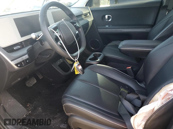 2023 Hyundai Ioniq 5 SEL with VIN KM8KNDAF3PU142975, listed as a Copart auction lot 53334005 with 33,244 mi miles and Salvage title. Bid and sale history available at DreamBid. Image 7.