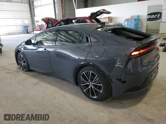 2023 Toyota Prius LE z VIN JTDADABU5P3002057, wystawiony jako Copart lot #47227675 z przebiegiem Nie podano mil oraz Szkoda całkowita • Salvage title. Historia ofert i sprzedaży dostępna na DreamBid. Obrazek 2.