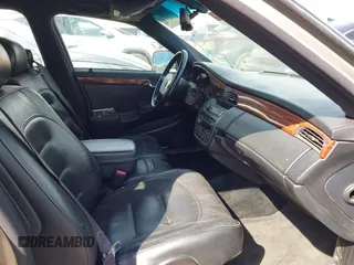 2003 Cadillac DeVille z VIN 1G6KD54Y23U115516, wystawiony jako IAAI lot #42053767 z przebiegiem 132 466 mil mil oraz . Historia ofert i sprzedaży dostępna na DreamBid. Obrazek 5.
