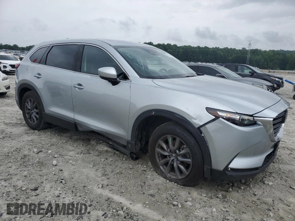 2023 Mazda CX-9 Touring with VIN JM3TCBCY2P0658759, listed as a Copart auction lot 59081855 with 61,480 mi miles and Salvage title. Bid and sale history available at DreamBid. Image 4.