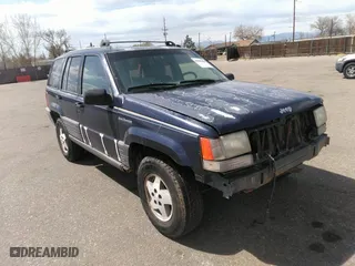 1994 Jeep Grand Cherokee Laredo with VIN 1J4GZ58Y3RC202638, listed as a IAAI auction lot 41885484 with 164,481 mi miles. Bid and sale history available at carsss.com. Image 1.