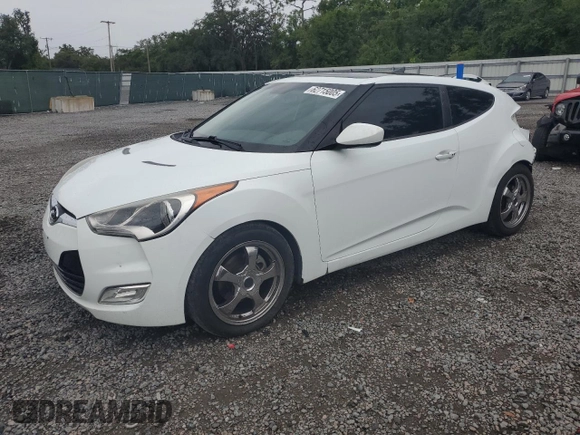 2012 Hyundai Veloster w/Black Int z VIN KMHTC6AD1CU030478, wystawiony jako Copart lot #62715005 z przebiegiem 127 625 mil mil oraz Szkoda całkowita • Salvage title. Historia ofert i sprzedaży dostępna na DreamBid. Obrazek 1.