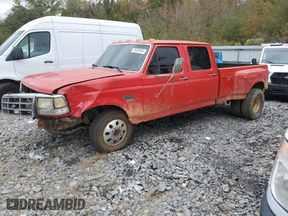 1996 Ford F-350 with VIN 1FTJW35F3TEB59586, listed as a Copart auction lot 79329304 with 199,054 mi miles and Salvage title. Bid and sale history available at DreamBid. Image 1.