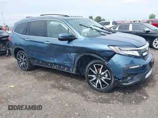 2019 Honda Pilot Elite with VIN 5FNYF6H06KB005457, listed as a IAAI auction lot 42291375 with Not provided miles and . Bid and sale history available at DreamBid. Image 1.