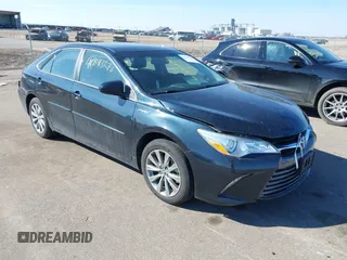 2015 Toyota Camry LE z VIN 4T1BD1FK8FU148065, wystawiony jako IAAI lot #41843278 z przebiegiem 91 137 mil mil oraz . Historia ofert i sprzedaży dostępna na DreamBid. Obrazek 1.