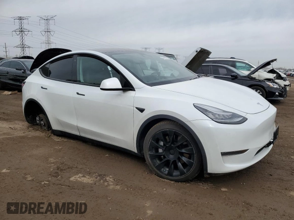 2020 Tesla Model Y Long Range with VIN 5YJYGDEE8LF008346, listed as a Copart auction lot 52863725 with 60,378 mi miles and Salvage Title. Bid and sale history available at DreamBid. Image 4.