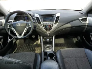 2013 Hyundai Veloster w/Black Int с VIN KMHTC6AD4DU139261, выставлен на аукционе Copart как лот 56175095 с пробегом 148 483 миль миль и Чистый • Clean title. История ставок и продаж доступна на DreamBid. Изображение 8.