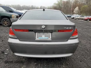 2004 BMW 7 Series 745i with VIN WBAGL63424DP68405, listed as a Copart auction lot 51768045 with 126,048 mi miles and Salvage Title. Bid and sale history available at DreamBid. Image 6.
