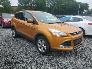 2016 Ford Escape SE с VIN 1FMCU9GXXGUA57569, выставлен на аукционе Copart как лот 61057195 с пробегом 143 025 миль миль и Чистый • Clean title. История ставок и продаж доступна на DreamBid. Изображение 4.