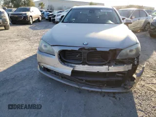 2009 BMW 7 Series 750Li with VIN WBAKB83569CY60521, listed as a Copart auction lot 82050884 with 142,788 mi miles and Salvage Title. Bid and sale history available at DreamBid. Image 5.