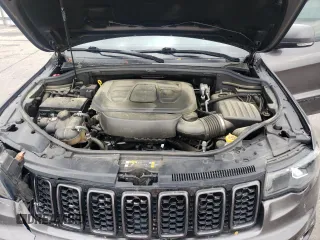 2021 Jeep Grand Cherokee 80th Anniversary z VIN 1C4RJEBG7MC679667, wystawiony jako Copart lot #54167225 z przebiegiem 77 268 mil mil oraz Szkoda całkowita • Salvage title. Historia ofert i sprzedaży dostępna na DreamBid. Obrazek 12.
