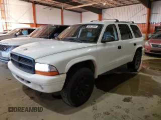 2002 Dodge Durango SLT z VIN 1B4HS48NX2F201020, wystawiony jako Copart lot #82871304 z przebiegiem 281 315 mil mil oraz Czysty tytuł • Clean title. Historia ofert i sprzedaży dostępna na DreamBid. Obrazek 1.