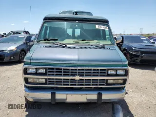 1994 Chevrolet Chevy Van z VIN 1GBEG25K9RF176079, wystawiony jako Copart lot #65824634 z przebiegiem 180 507 mil mil oraz Czysty tytuł • Clean title. Historia ofert i sprzedaży dostępna na DreamBid. Obrazek 5.