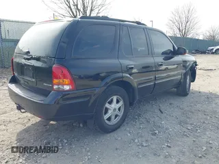 2002 Oldsmobile Bravada z VIN 1GHDT13S222469507, wystawiony jako IAAI lot #41787362 z przebiegiem Nie podano mil oraz . Historia ofert i sprzedaży dostępna na DreamBid. Obrazek 4.
