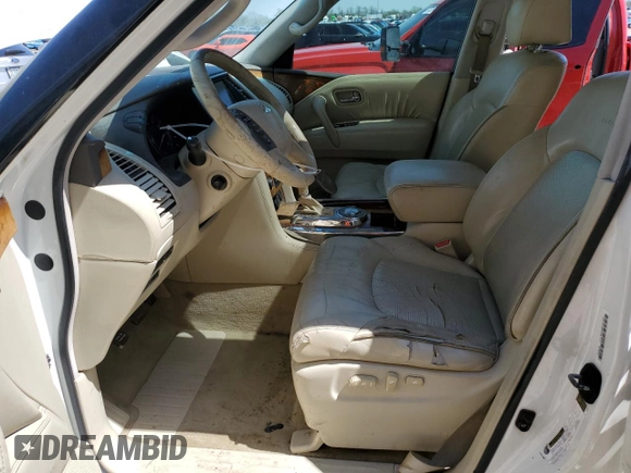 2012 Infiniti QX56 8-passenger with VIN JN8AZ2NDXC9715034, listed as a Copart auction lot 52148395 with 227,943 mi miles and Salvage title. Bid and sale history available at DreamBid. Image 7.