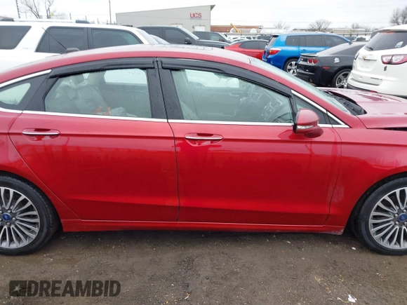 2017 Ford Fusion SE z VIN 3FA6P0H98HR175087, wystawiony jako IAAI lot #41557481 z przebiegiem 103 752 mil mil oraz . Historia ofert i sprzedaży dostępna na DreamBid. Obrazek 13.
