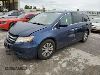 2014 Honda Odyssey EX-L with VIN 5FNRL5H60EB082423, listed as a Copart auction lot 57823195 with 192,955 mi miles and Salvage title. Bid and sale history available at DreamBid. Image 1.