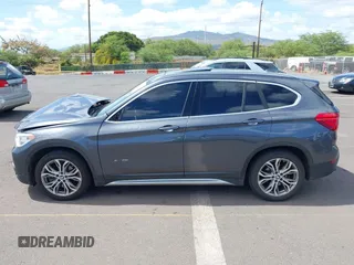 2017 BMW X1 xDrive28i with VIN WBXHT3Z31H4A56113, listed as a IAAI auction lot 42397932 with 70,252 mi miles and . Bid and sale history available at DreamBid. Image 15.