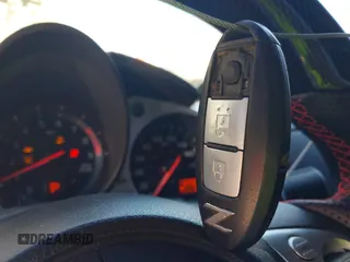 2015 Nissan 370Z Sport with VIN JN1AZ4EH9FM443719, listed as a IAAI auction lot 41677286 with 87,967 mi miles and . Bid and sale history available at DreamBid. Image 11.